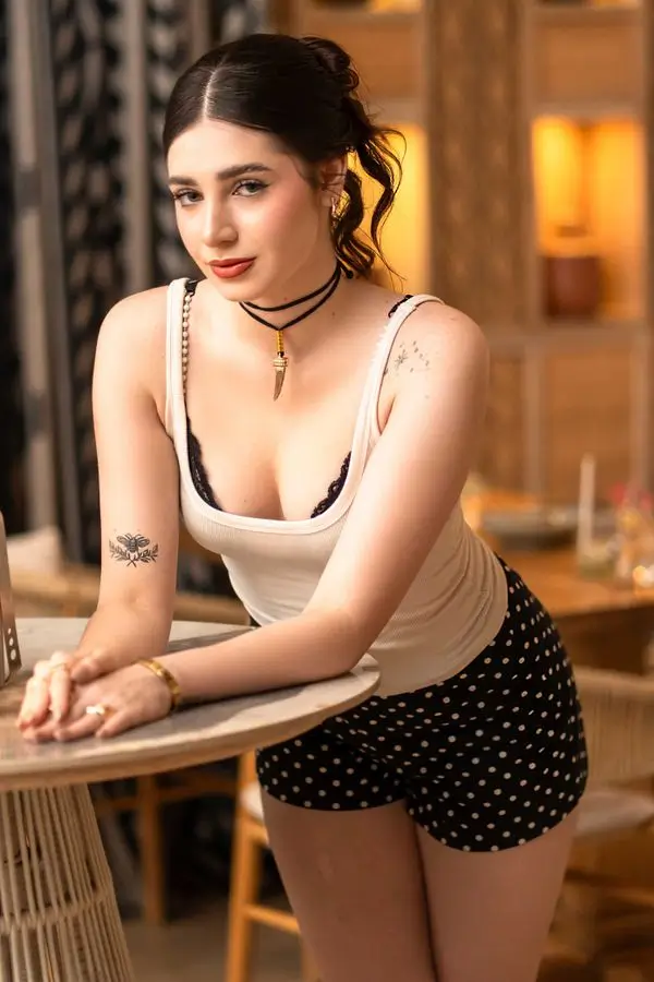 Sofia call girls in greater Noida indoor warm light photo